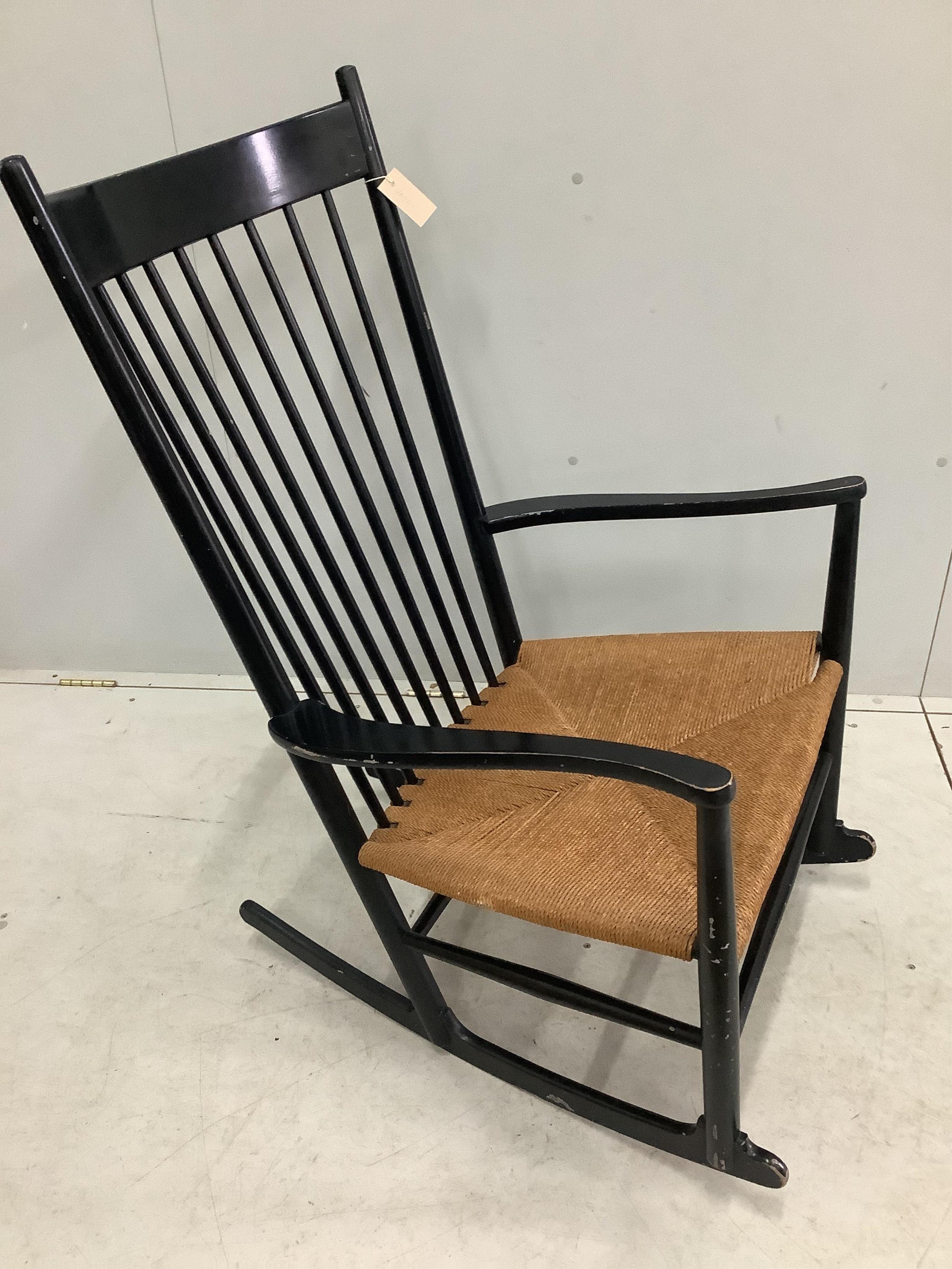 A Hans Weger J16 model rocking chair, width 61cm, depth 47cm, height 109cm. Condition - fair